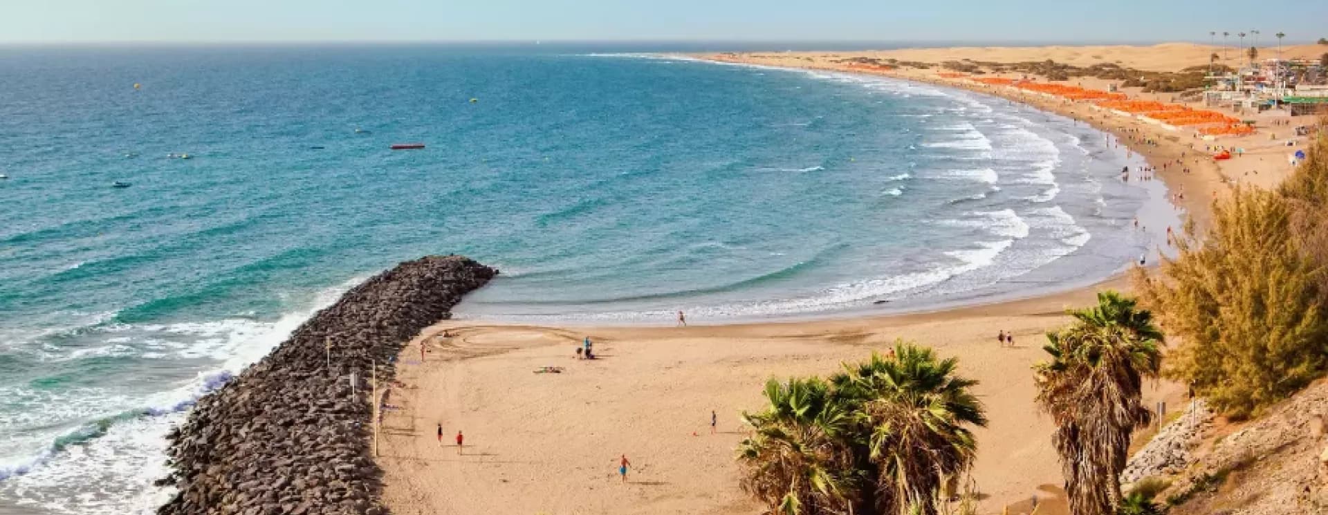 Aerial view of Playa del Inglés beach and Maspalomas dunes — south Gran Canaria private transfer from Las Palmas